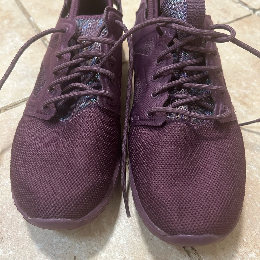 Purple Reebok sneakers